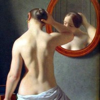 Mujer frente un espejo